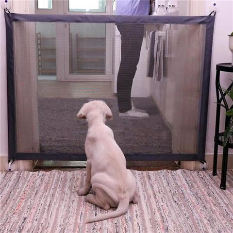 Pet safety barrier gate set up in doorway