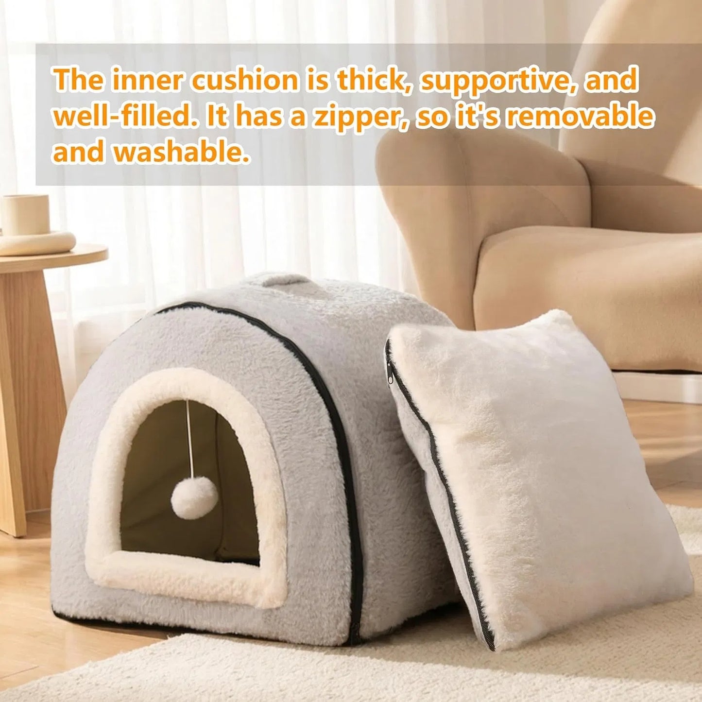 Cat resting inside foldable cave