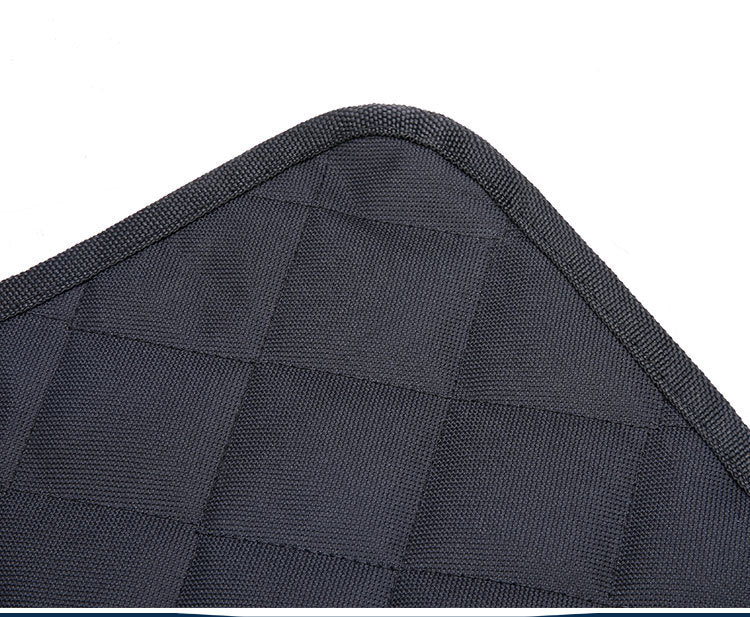 Dog sitting safely on waterproof car seat hammock cover
