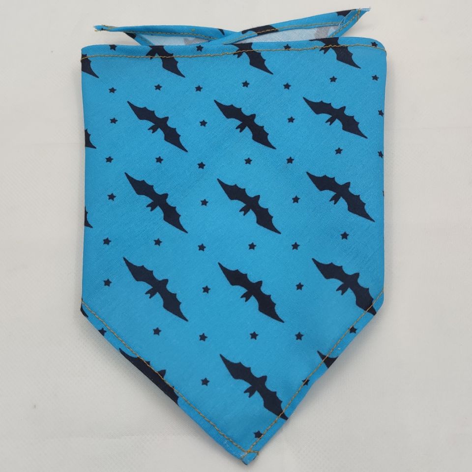 Cat wearing triangle pet bandana in multiple colors