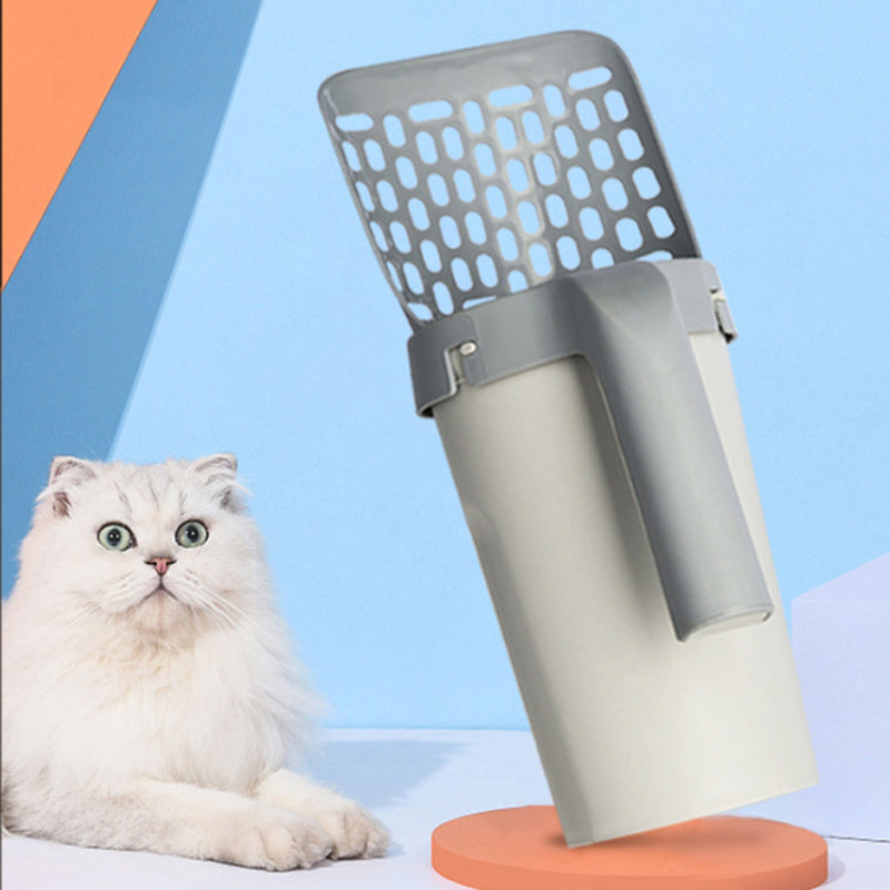 Cat litter scoop with integrated waste bag storage box