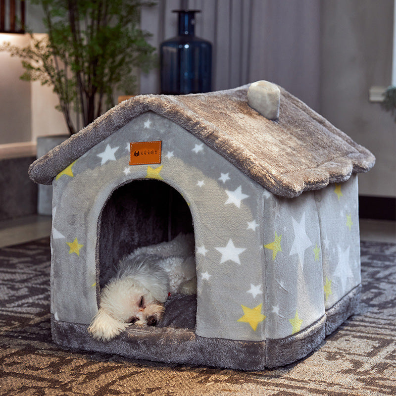 Cat inside enclosed plush villa pet house with self-warming interior