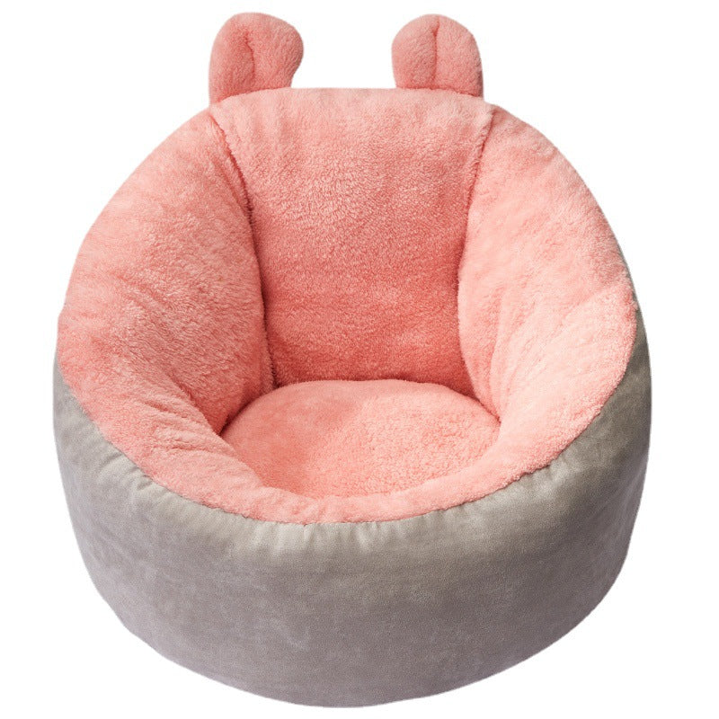 Cat sleeping comfortably inside plush sleeping bag kennel