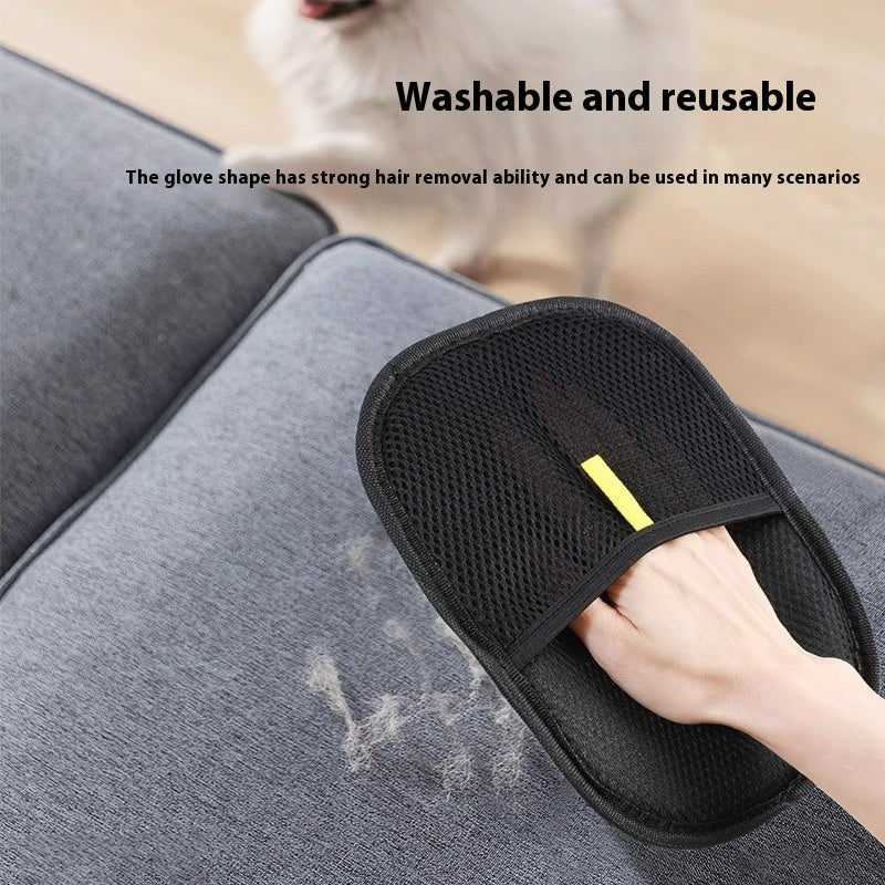 Pet grooming massage glove collecting loose dog fur
